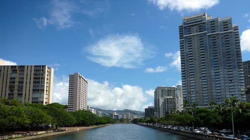 Ala Wai Canal Hotels, Condos, and Trees on a nice day in Waikiki on Oahu