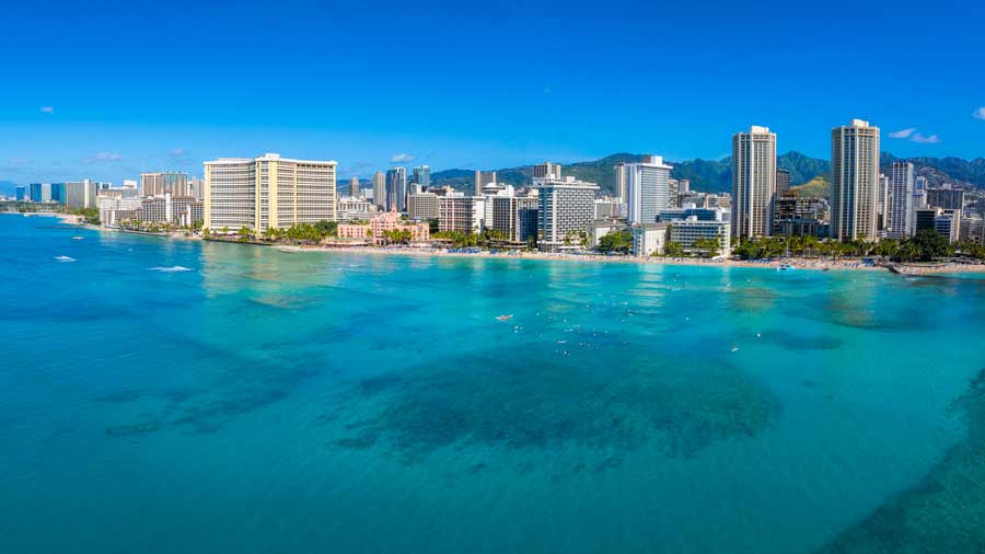 view-of-waikiki-beach-and-royal-hawaiian-hotel-in-honolulu view of waikik beach and royal hawaiin hotel in Honolulu