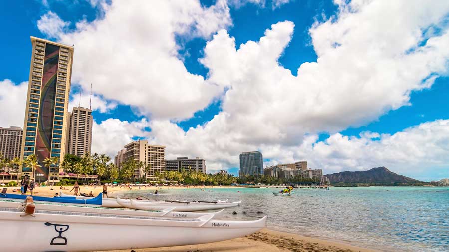 Waikiki shoreline with tourist in Honolulu