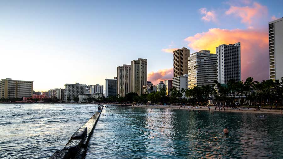 ocean water Waikiki beach and hotel towers Hawaii